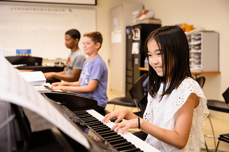 piano class in session